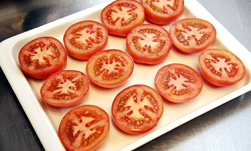 Fresh Sliced Tomatoes on White Ceramic Tray