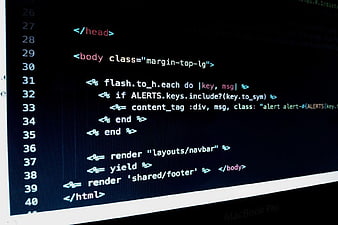 Ruby on Rails Code on Dark Laptop Screen