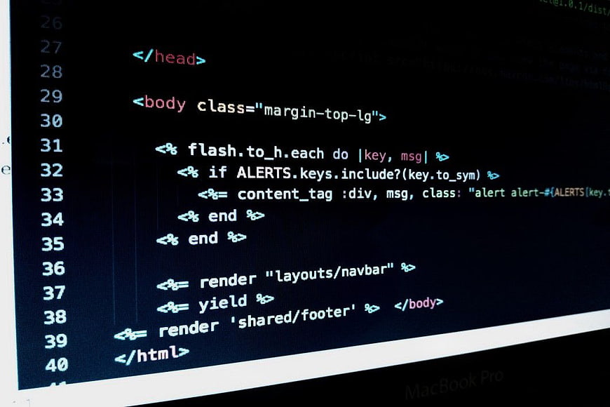 Ruby on Rails Code on Dark Laptop Screen