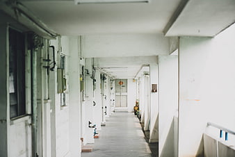 Empty Concrete School Corridor with White Walls