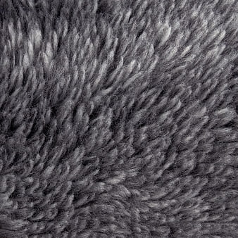 Close-up of gray knitted wool fabric texture