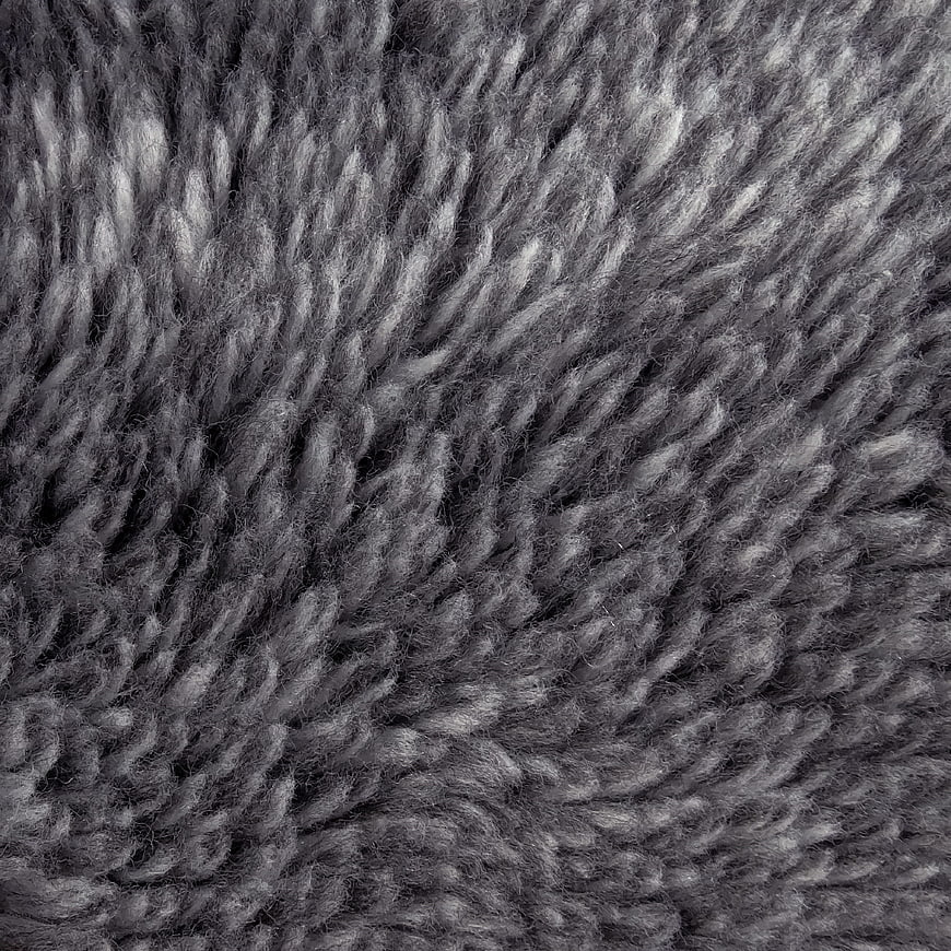 Close-up of gray knitted wool fabric texture