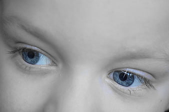 Close-up of blue eyes with dreamy soft focus and cool tones