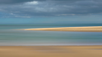 Serene Sandbar Landscape with Calm Turquoise Waters