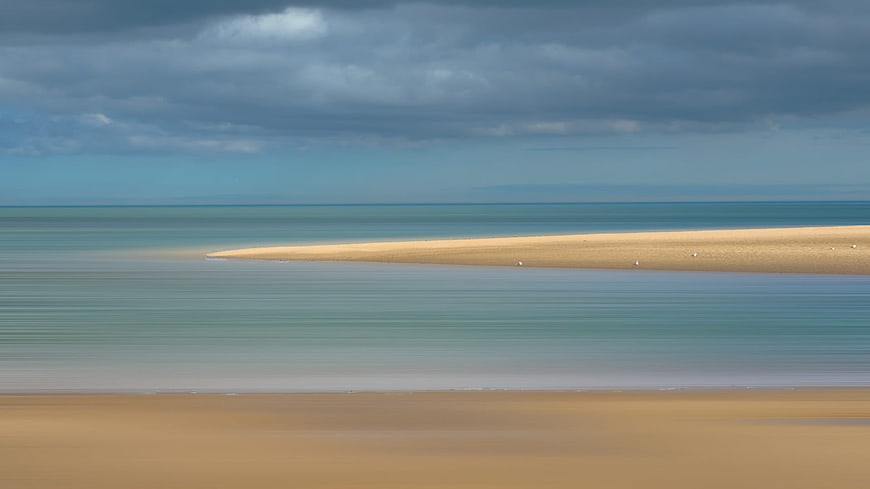 Serene Sandbar Landscape with Calm Turquoise Waters