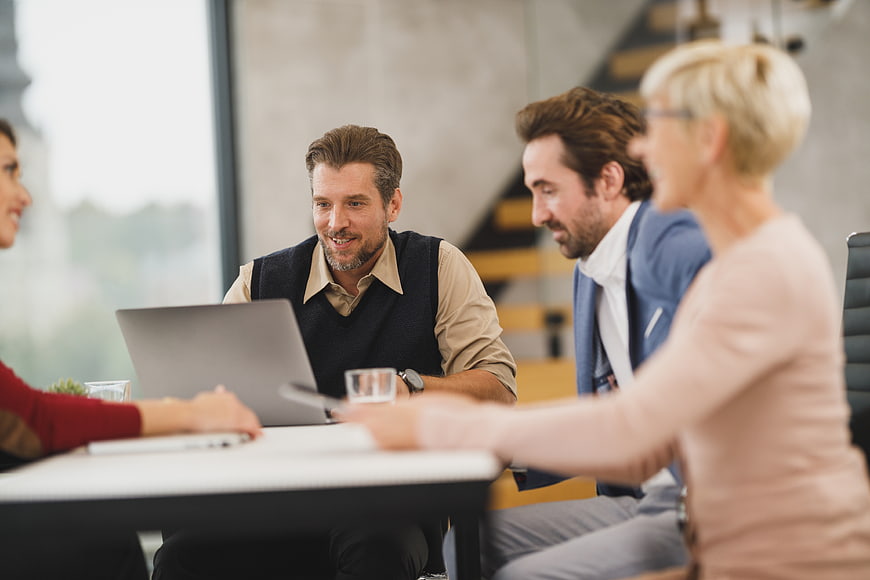 Business team meeting discussion in modern office