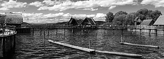 Black and white panoramic view of pile dwellings on Lake Constance