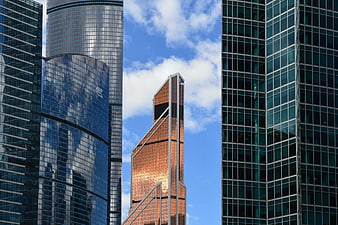 Modern Skyscrapers with Glass Facades Against Blue Sky