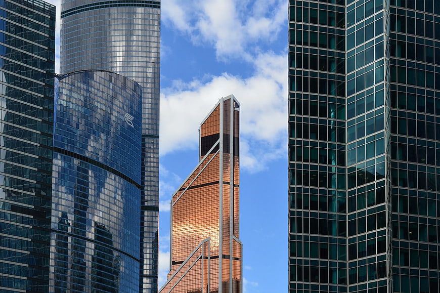 Modern Skyscrapers with Glass Facades Against Blue Sky