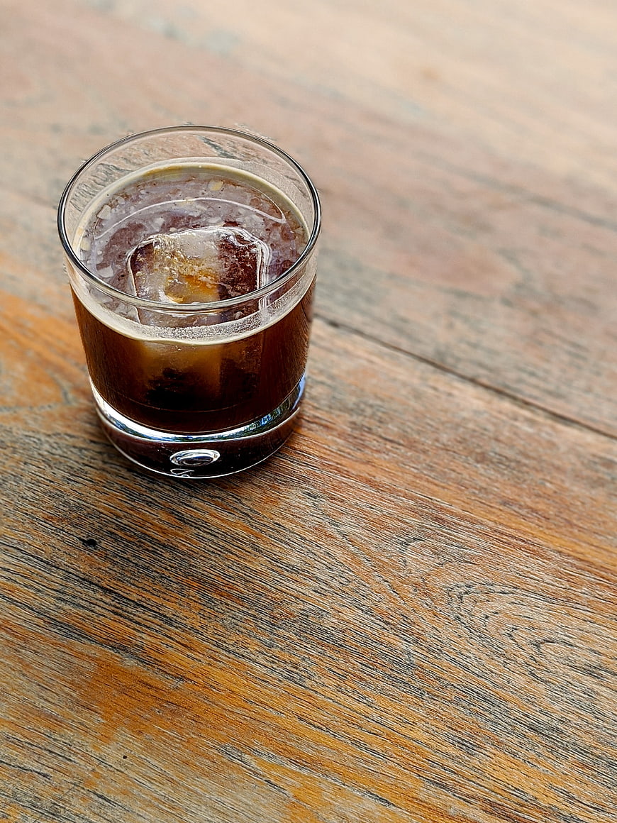 Iced Americano Coffee on Rustic Wooden Table