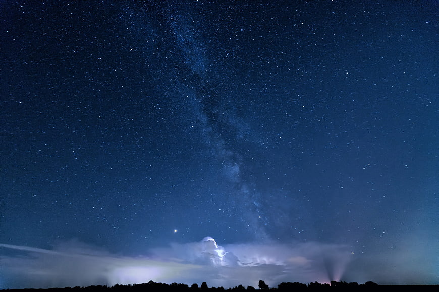 Milky Way Galaxy Above Distant Thunderstorm Night Sky