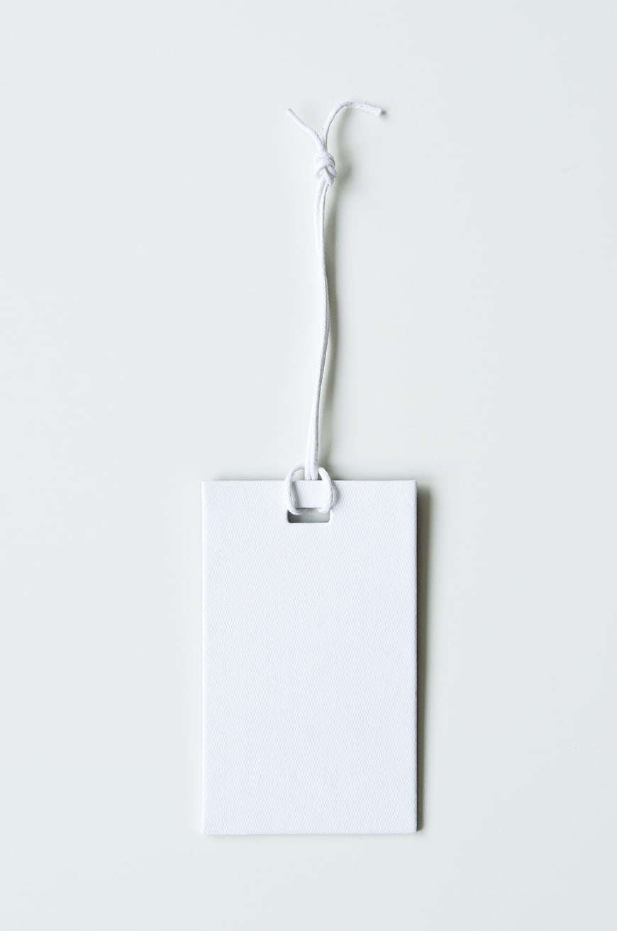 Blank White Paper Tag with String on White Background