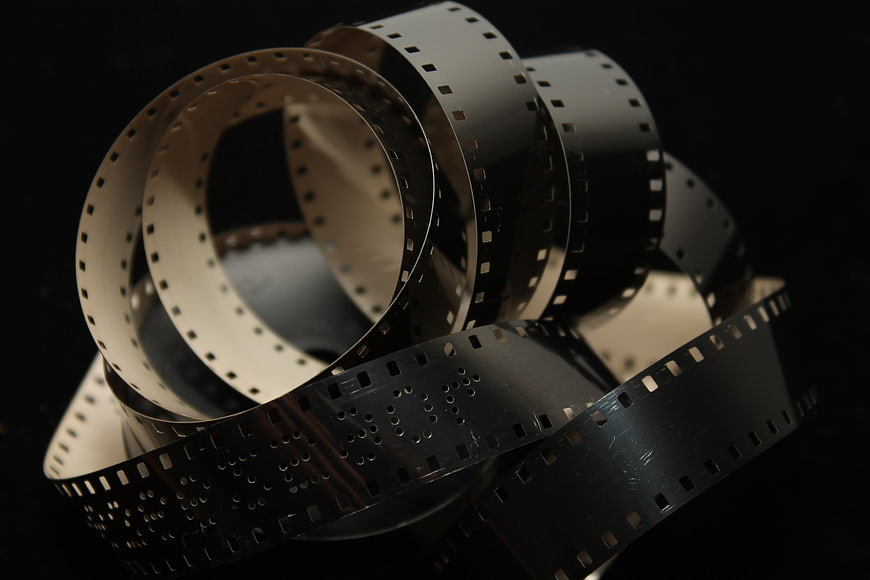 Vintage film strip loops on black background