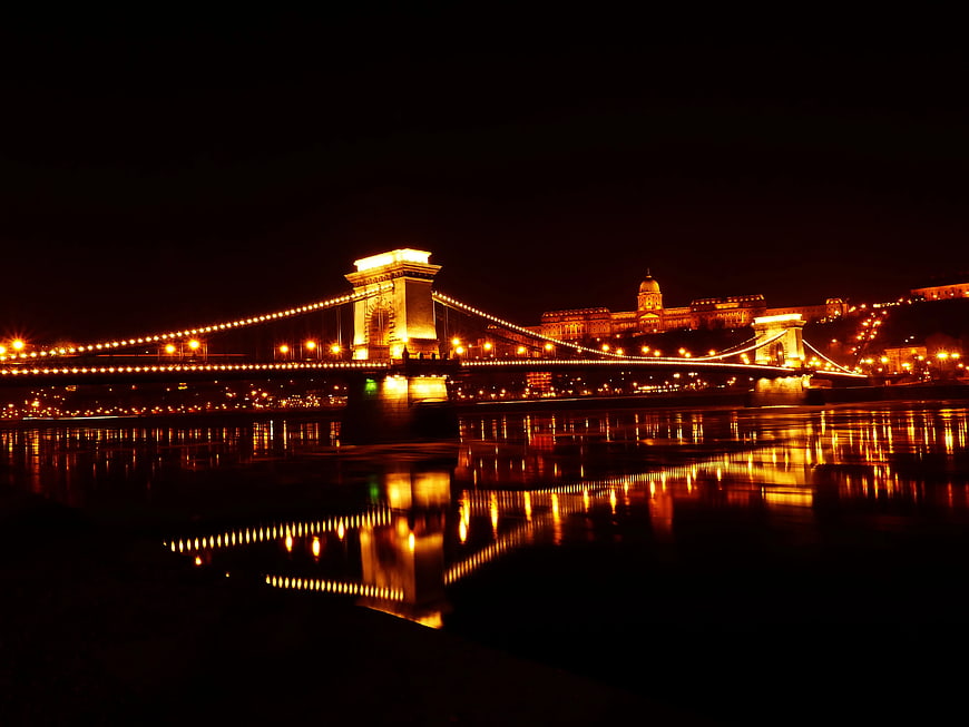 Illuminated Chain Bridge and Parliament at Night in Budapest