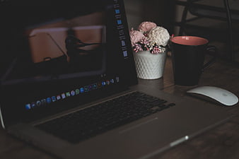 Dark Moody Workspace with Laptop, Coffee, and Flowers