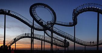 Silhouette of Infinity Loop Bridge at Sunset