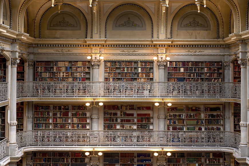 Grand interior of historic George Peabody Library in Baltimore