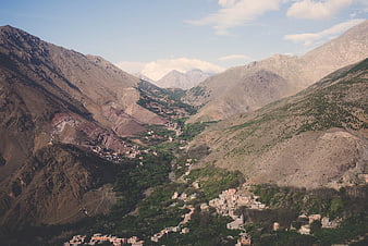 Scenic mountain village nestled in a lush green valley