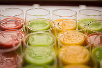 Colorful fruit and vegetable smoothies in glasses