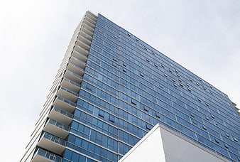 Low Angle View of Modern Glass Office Building