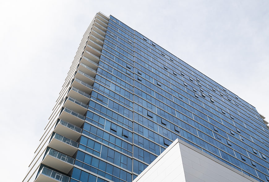 Low Angle View of Modern Glass Office Building