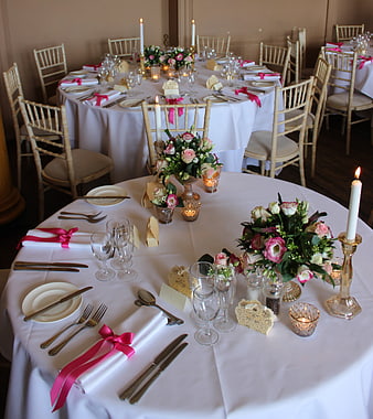 Elegant Wedding Reception Table Setting with Pink Ribbons