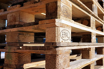 Stacked EPAL Euro Pallets In Industrial Warehouse