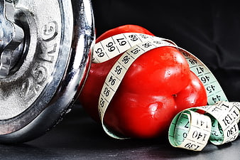 Red Bell Pepper with Dumbbell and Measuring Tape