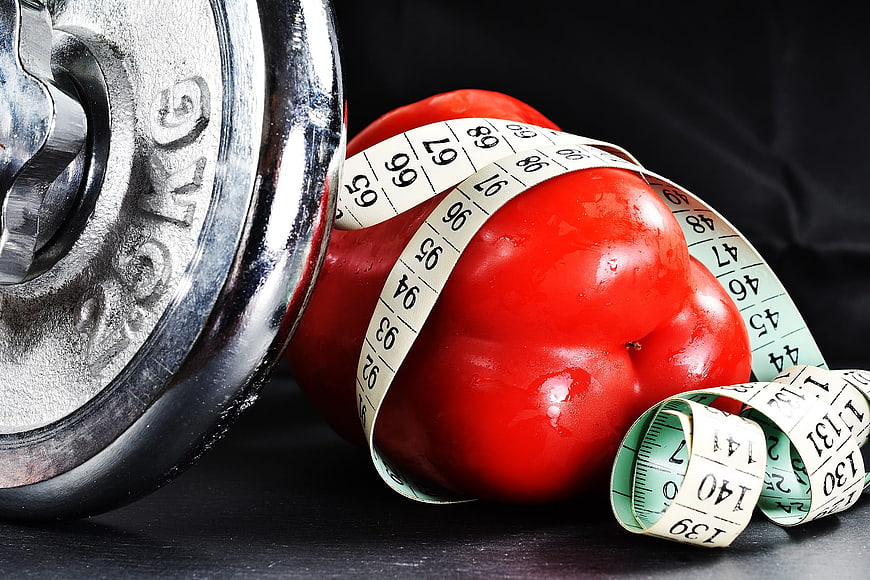 Red Bell Pepper with Dumbbell and Measuring Tape