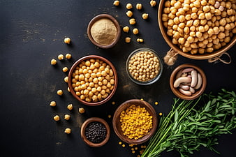 Top View of Healthy Legumes and Herbs on Dark Background