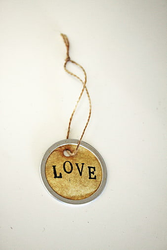 Vintage Round Tag with Love Text on White Background