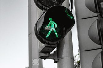 Green Pedestrian Traffic Light Signal Close-Up