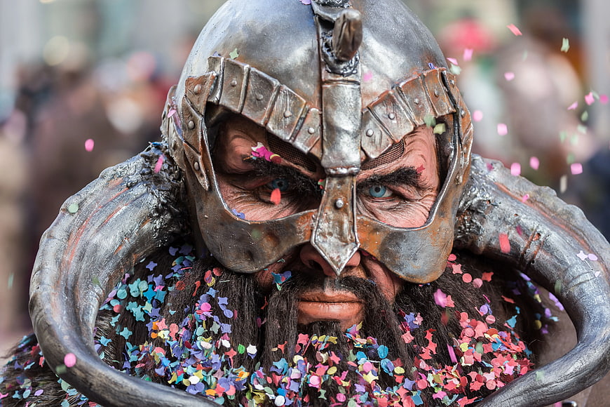 Close-up of Viking Warrior with Horned Helmet and Confetti