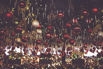 Festive Christmas Ornaments Hanging in a Department Store