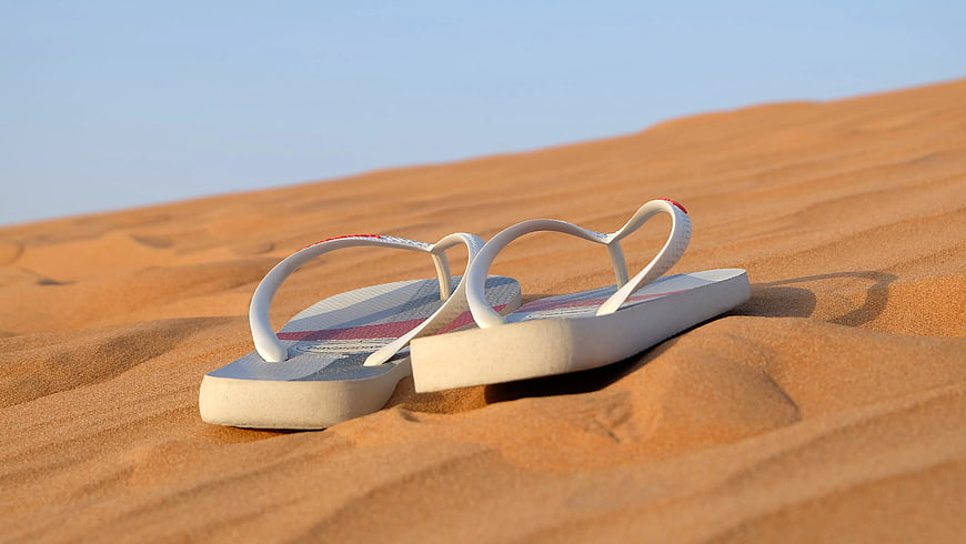 White Flip-flops on Sand Dunes