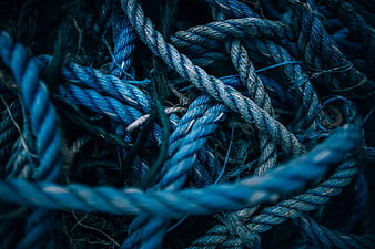 Close-up of tangled blue nautical rope texture