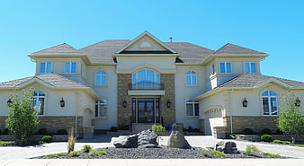 Luxury Two-Story Residential Home Exterior With Stone And Stucco Facade