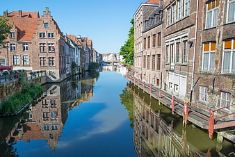Historic Brick Buildings Lining a Canal in Ghent, Belgium