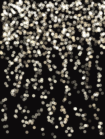Gold Glitter Falling on Black Background