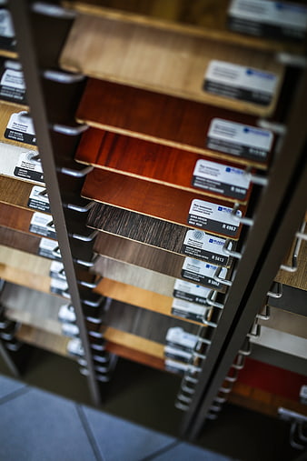 Wood laminate flooring samples in display rack