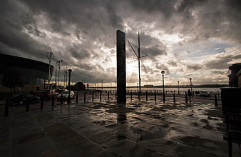 Dramatic cloudy sky over Albert Dock Liverpool waterfront