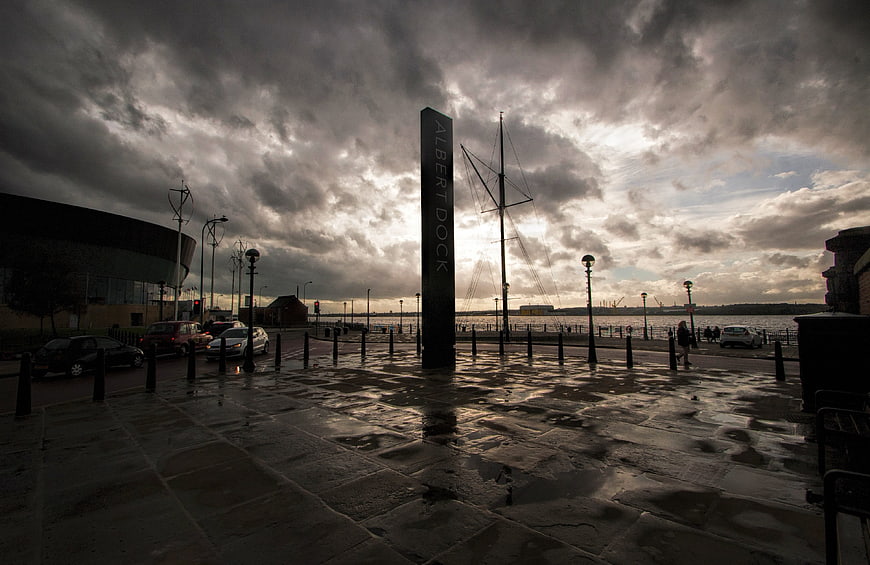 Dramatic cloudy sky over Albert Dock Liverpool waterfront