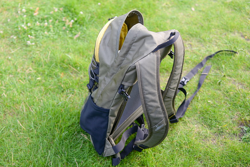 Gray Hiking Backpack on Green Grass