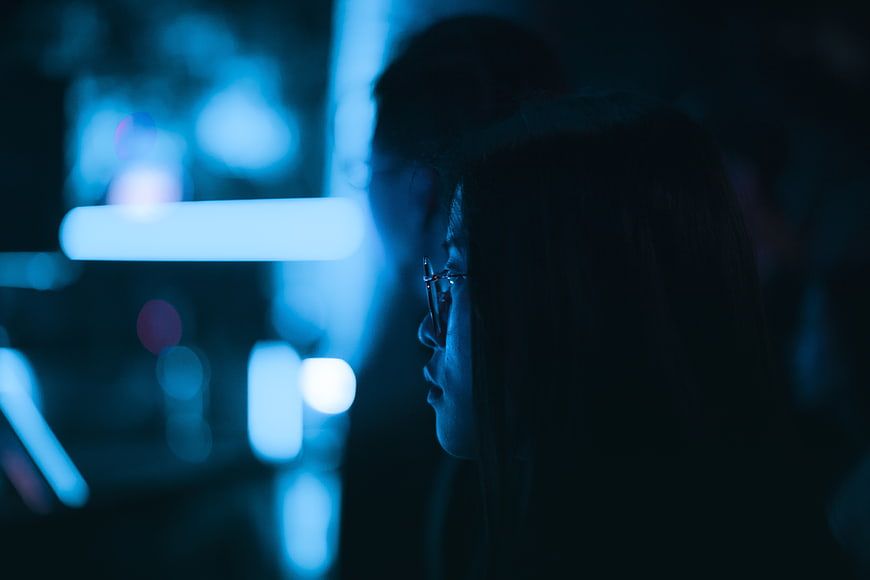 Woman in Profile with Blue Bokeh Lights
