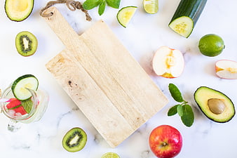 Fresh Fruit and Vegetable Flat Lay with Wooden Cutting Board