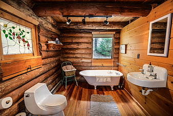 Rustic Log Cabin Bathroom Interior With Clawfoot Tub