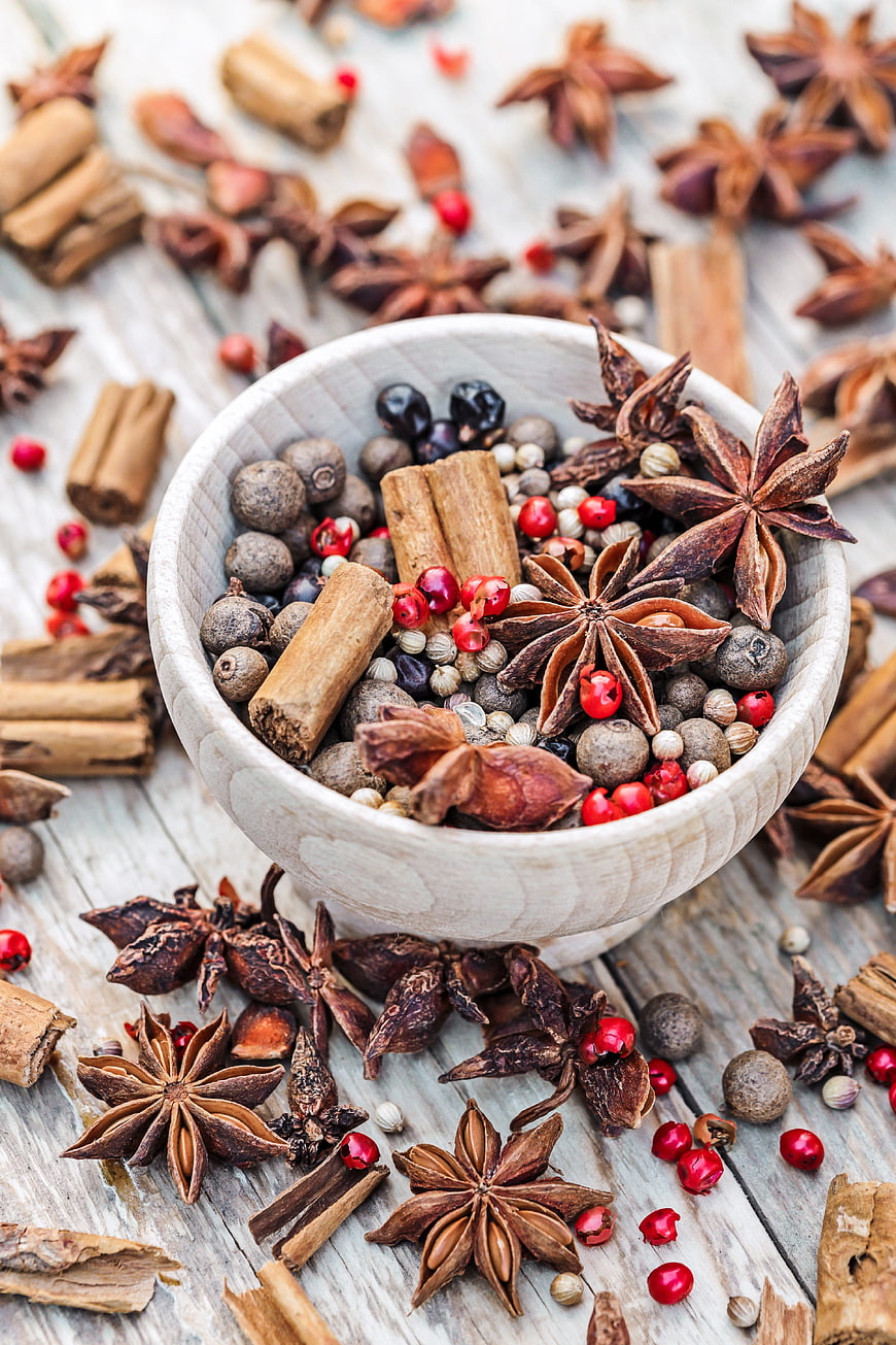 Wooden Bowl of Mixed Spices on Rustic Table