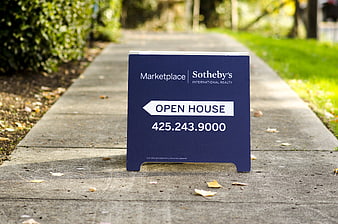 Sotheby's International Realty Open House Sign on Concrete Pathway