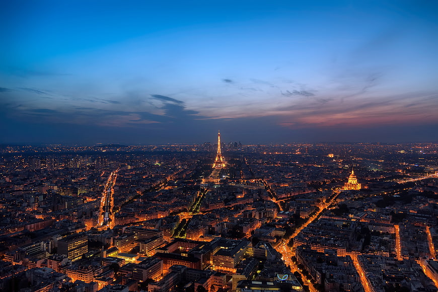 Aerial View of Paris Cityscape at Dusk with Eiffel Tower