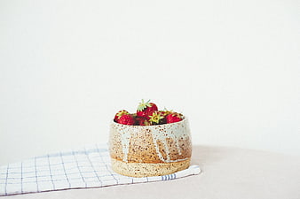 Ceramic Bowl of Fresh Strawberries on White Background